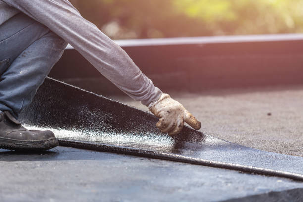 Professional Exterior Waterproofing technician working in Auburn, KS